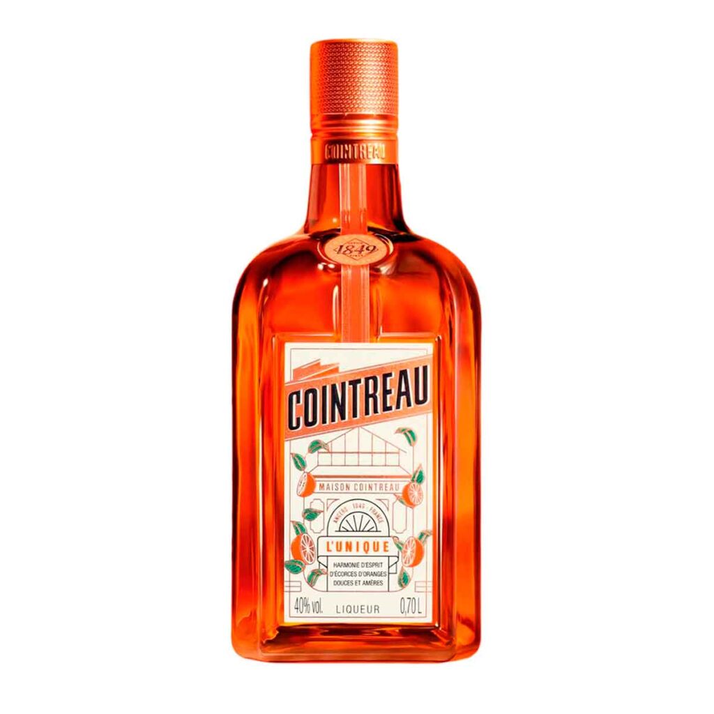 Garrafa de licor Cointreau 700ml com rótulo laranja e branco, vista frontal.