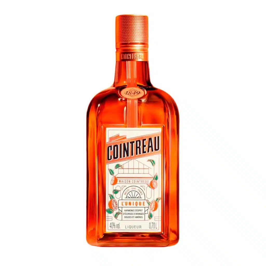 Garrafa de licor Cointreau 700ml com rótulo laranja e branco, vista frontal.