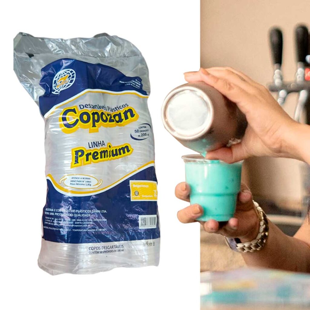 Drink Aquarium servido no copo descartável 200ml da Copozan – feito com vodka, suco de abacaxi, xarope Blue e leite condensado – ideal para eventos e festas com barman contratado.